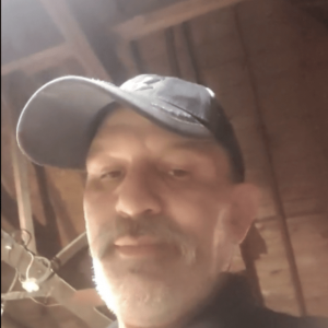 Randy in his home, on a video call