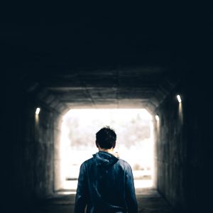 man-walking-in-tunnel