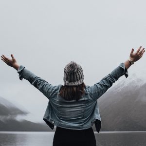 woman-outside-arms-in-the-air